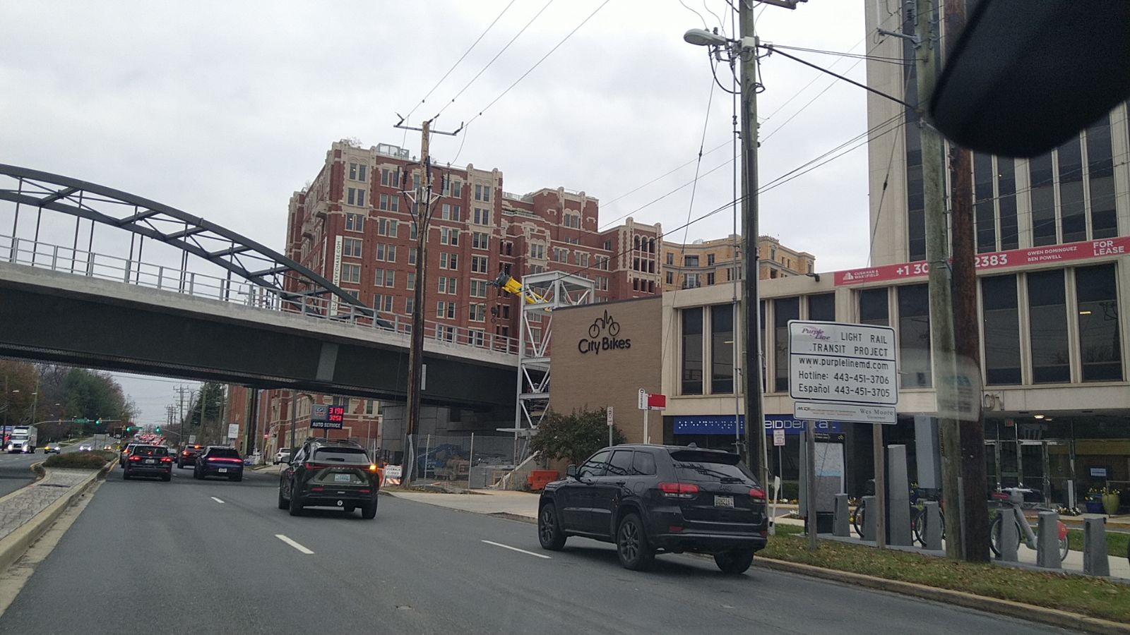 Street view of buildings and a bridge in Chevy Chase, Maryland