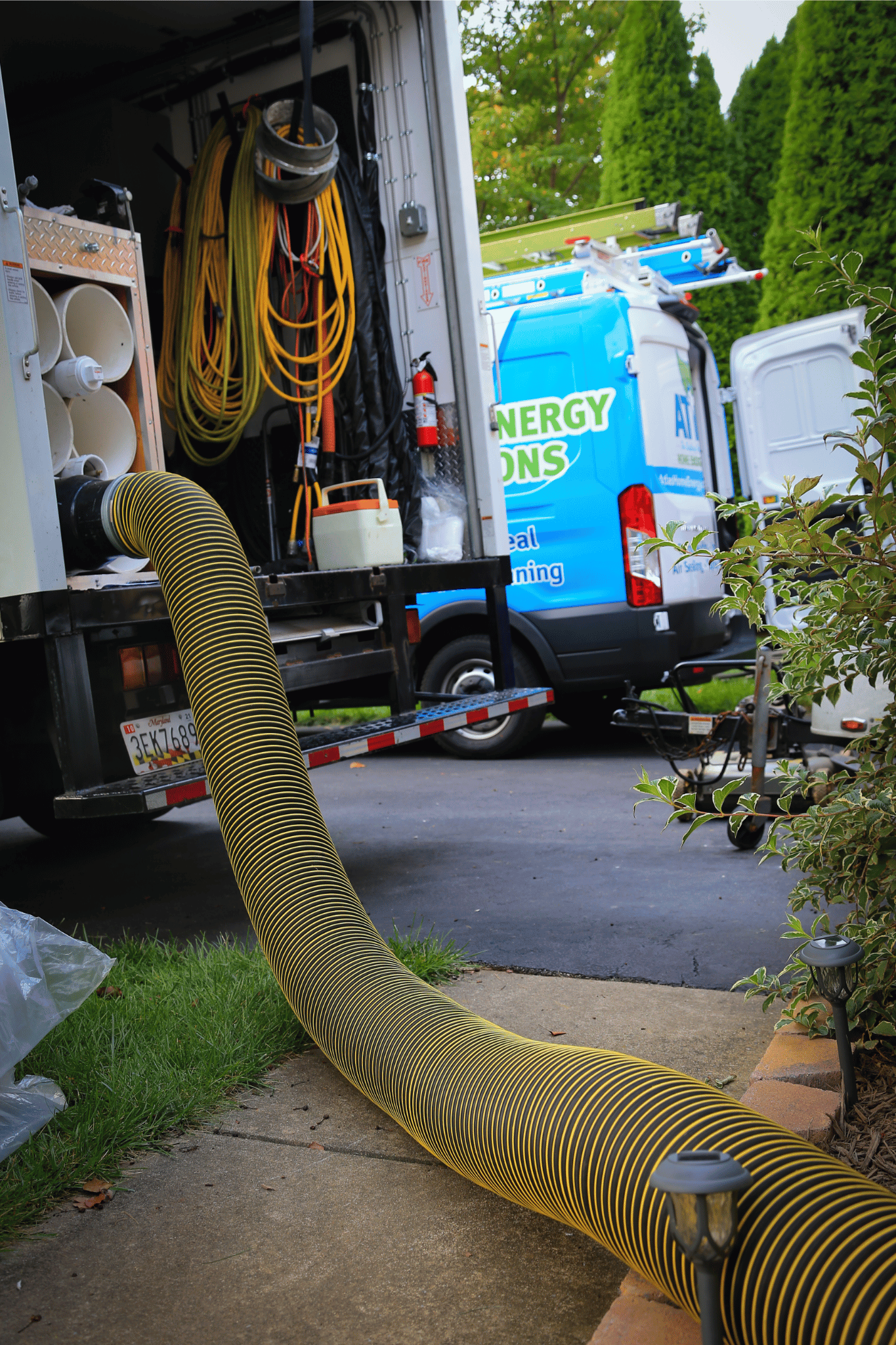 Work truck with vacuum system for duct cleaning