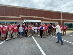 A company team picture of an even promoting Net Zero energy