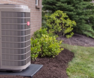 Heat pump outdoors by house